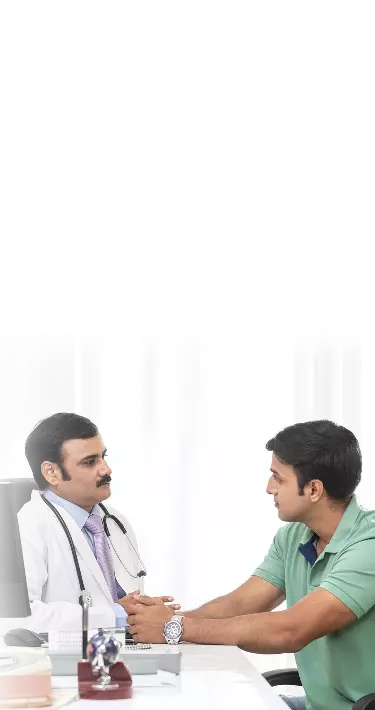Man speaking to doctor regarding sperm freezing